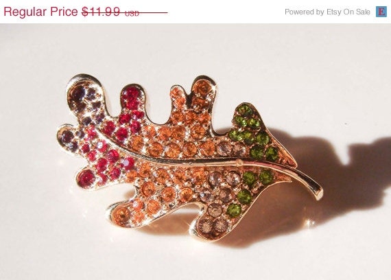 Summer Sale Vintage Monet Gold Leaf with Red Yellow Green Rhinestones Brooch