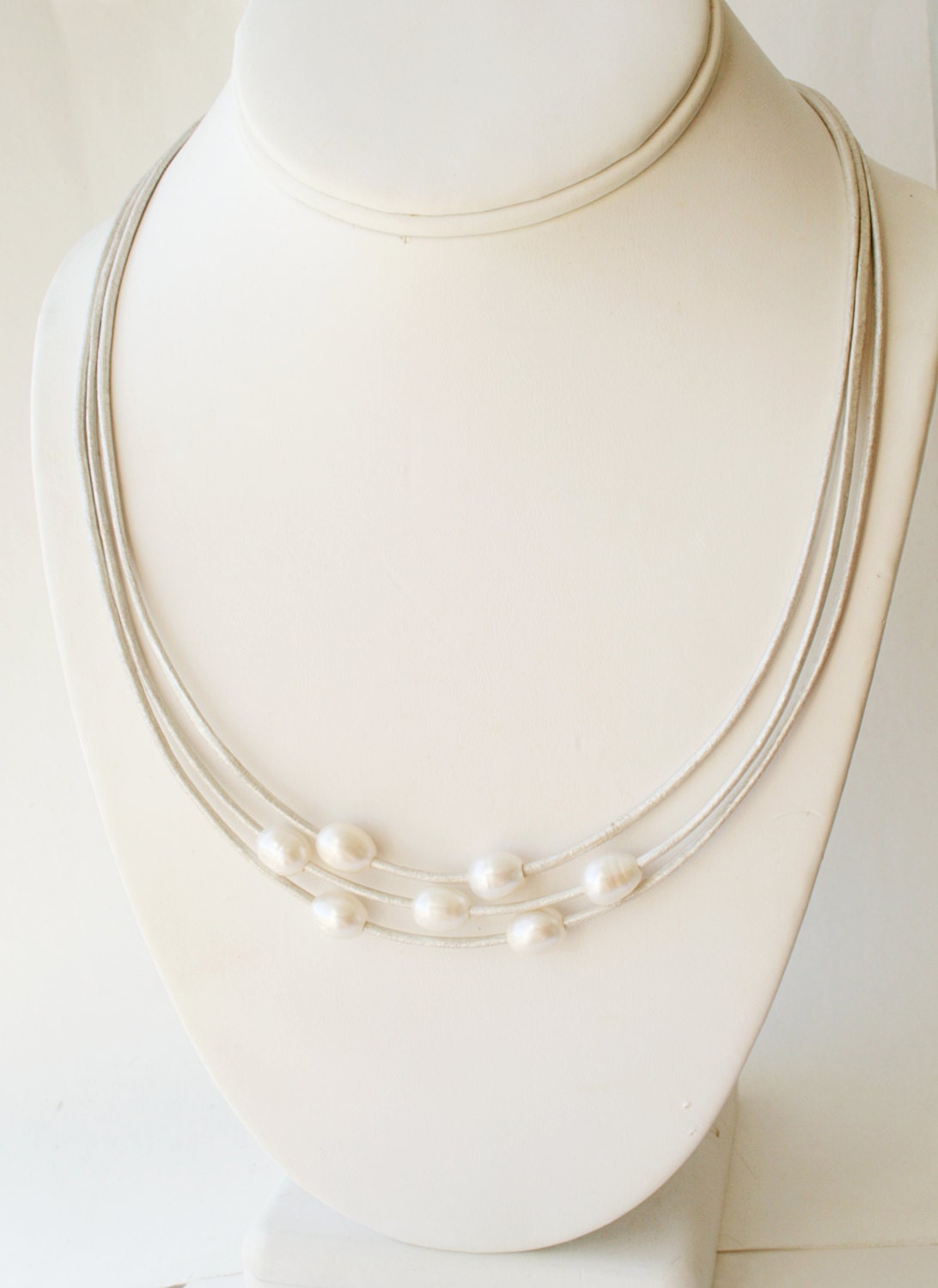 Pearl leather necklace, triple strand white metallic leather