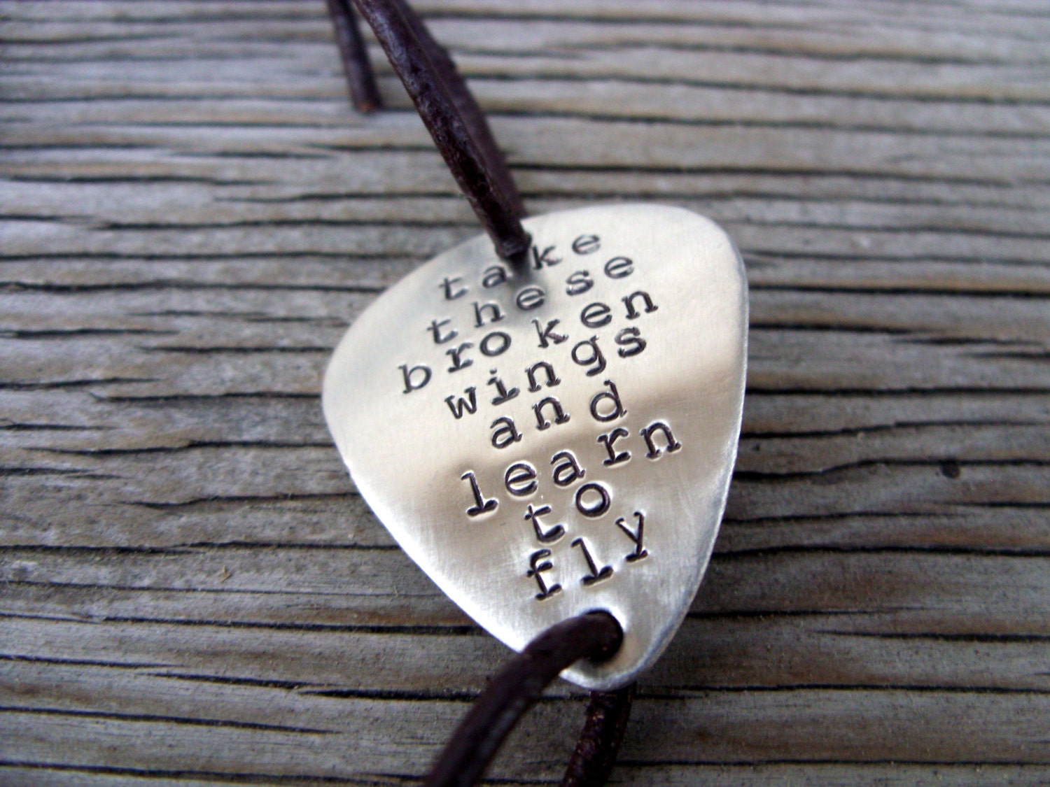 Hand stamped custom nickel silver guitar pick bracelet with leather cord- great unisex gift- adjustable