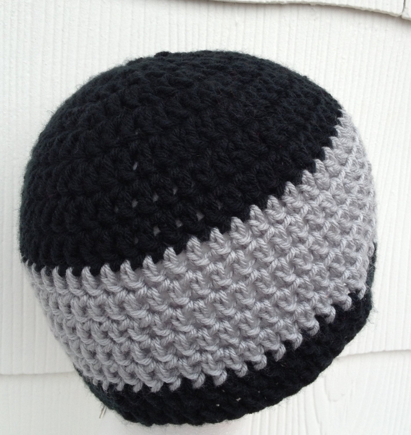 Summer Sale 20% off w/ code "Summer" Oakland Raiders Black & Silver Crocheted Beanie.  Great for NFL fans going to the game in cold weather
