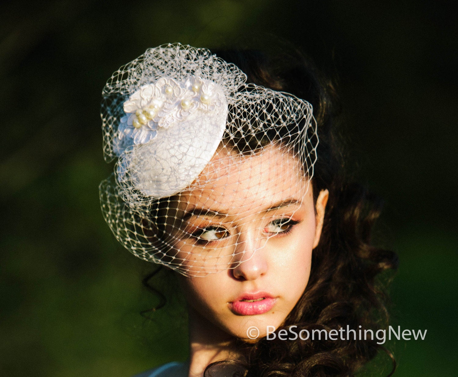 wedding hat fascinator with birdcage veil