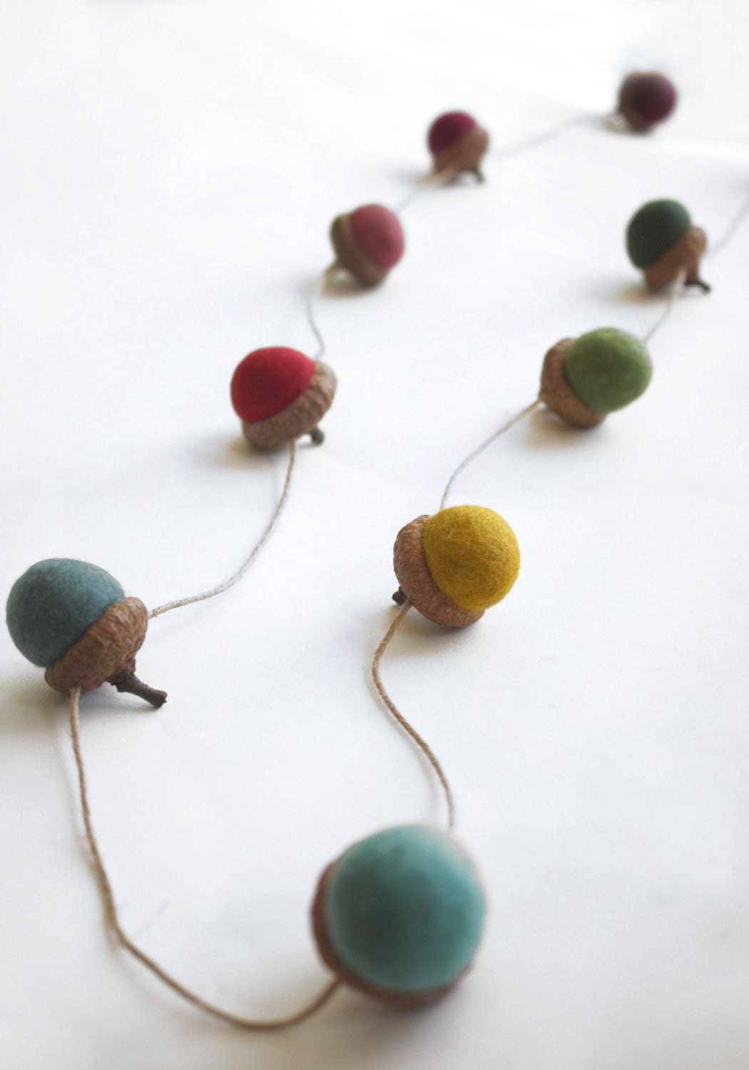 Felted Acorn Garland - ten colorful handfelted acorns on hemp string