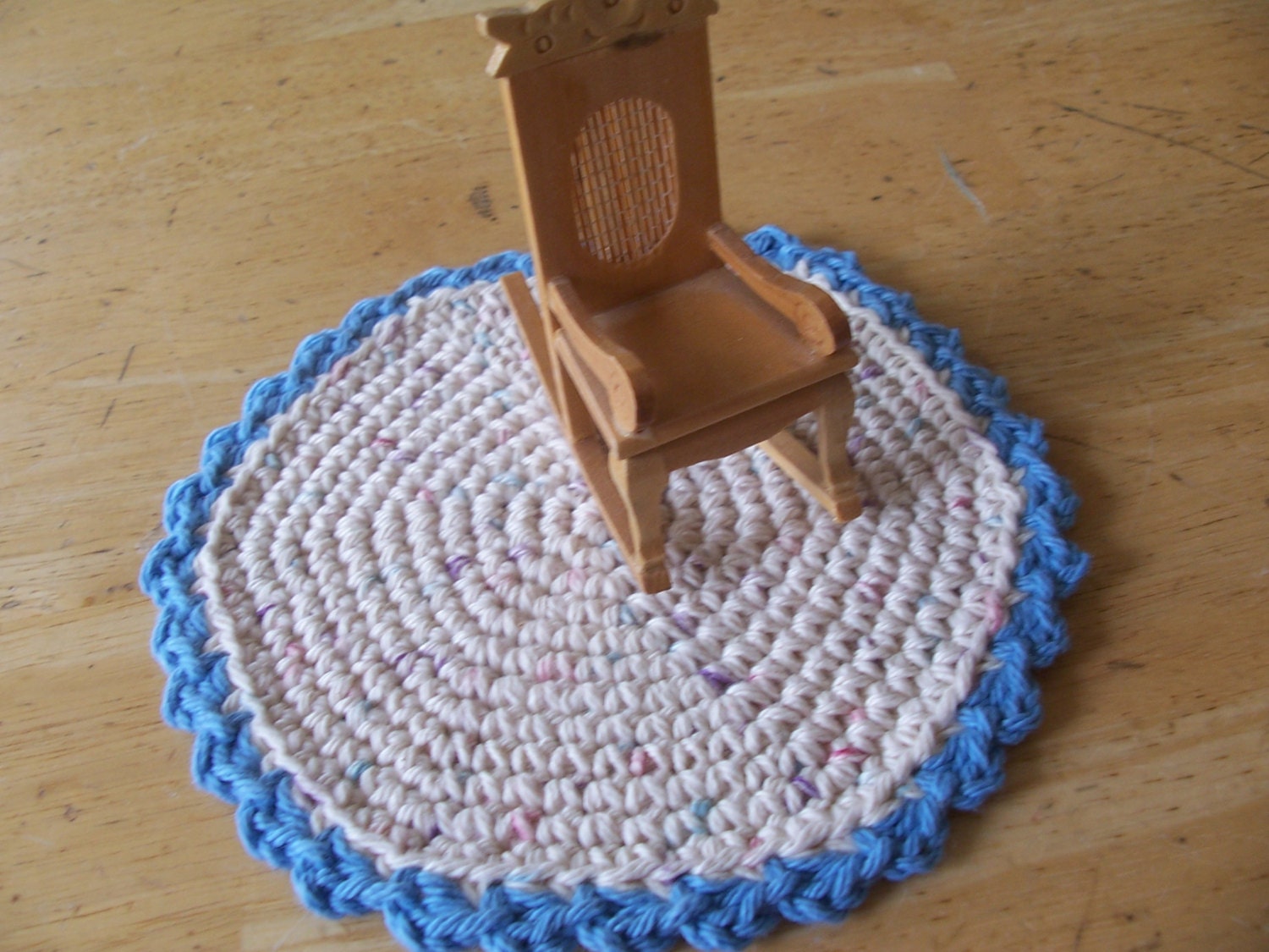 Miniature  crochet 7 inch round  rug in pastel fleck for the dollhouse Blue Trim