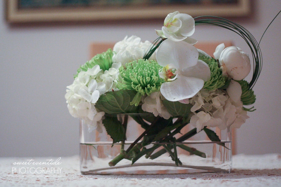 still life modern tablescape table setting flower picture white green