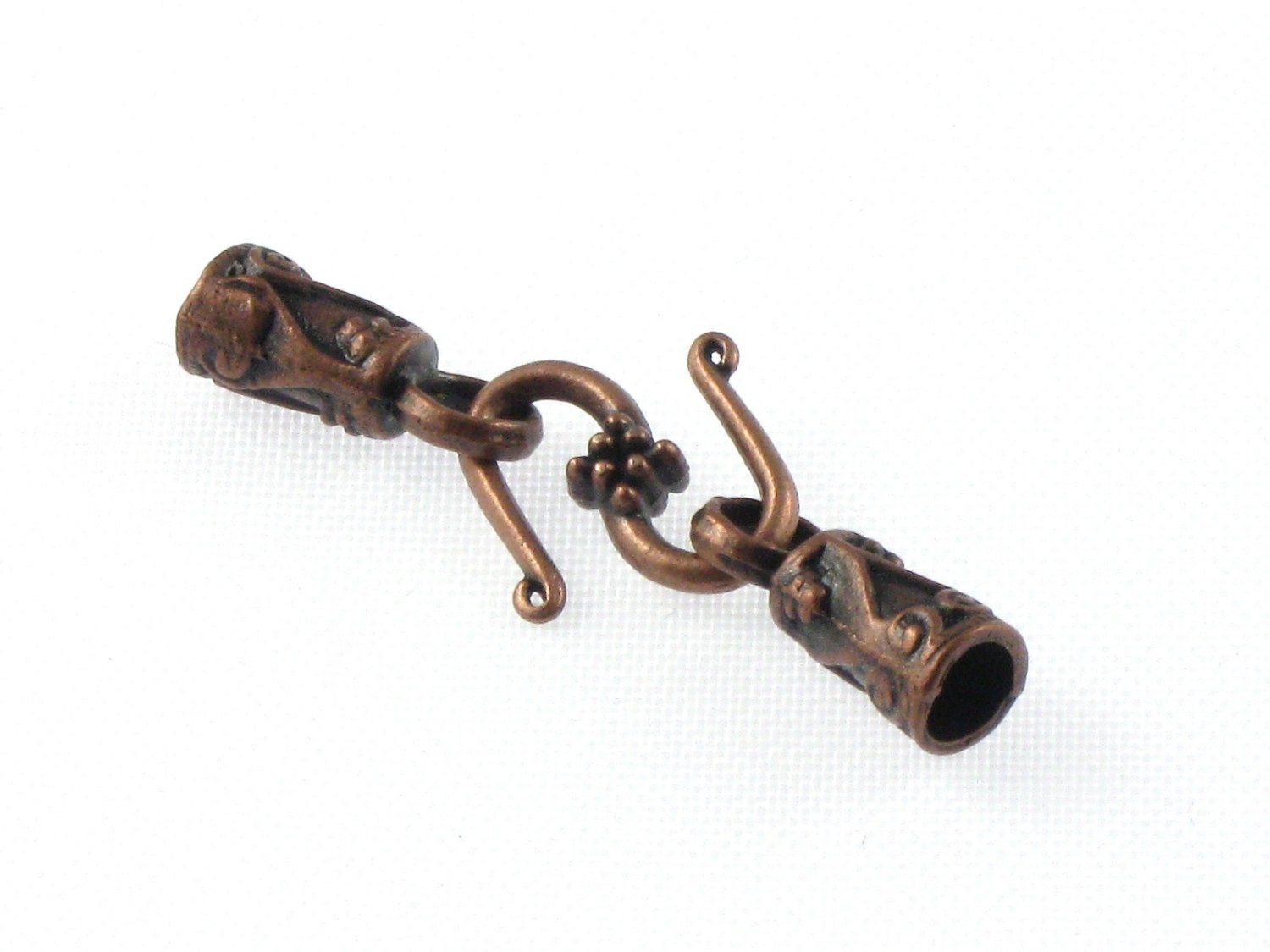 5 sets of End Caps and S Hook . Antique copper finish. Fits 3mm leather cord (EC15ac)