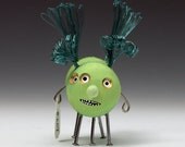 lime green wood sculpture