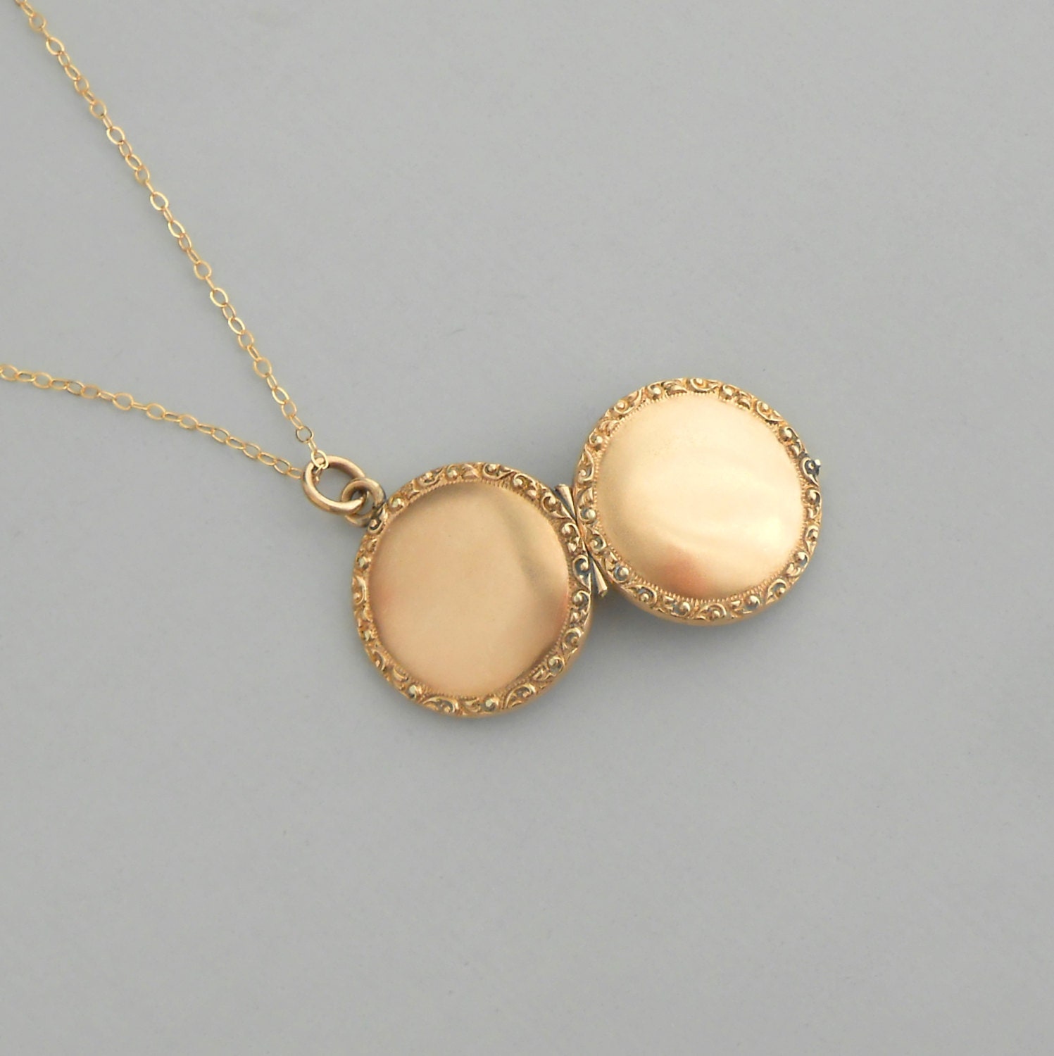 Antique Victorian Locket. Repousee Frame. Small.