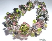 METRO GIRL Handmade Lampwork Bead Bracelet Shimmery Sparkly Pink Green Black  Silver Bold and Bohemian  Artist Made