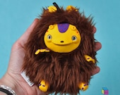 Softie Cute Monster Polymer CLay Sculpture Kawaii Yeti Squeaker Toy Plush Sasquatch - Brown fur, yellow skin - Kriture no.98