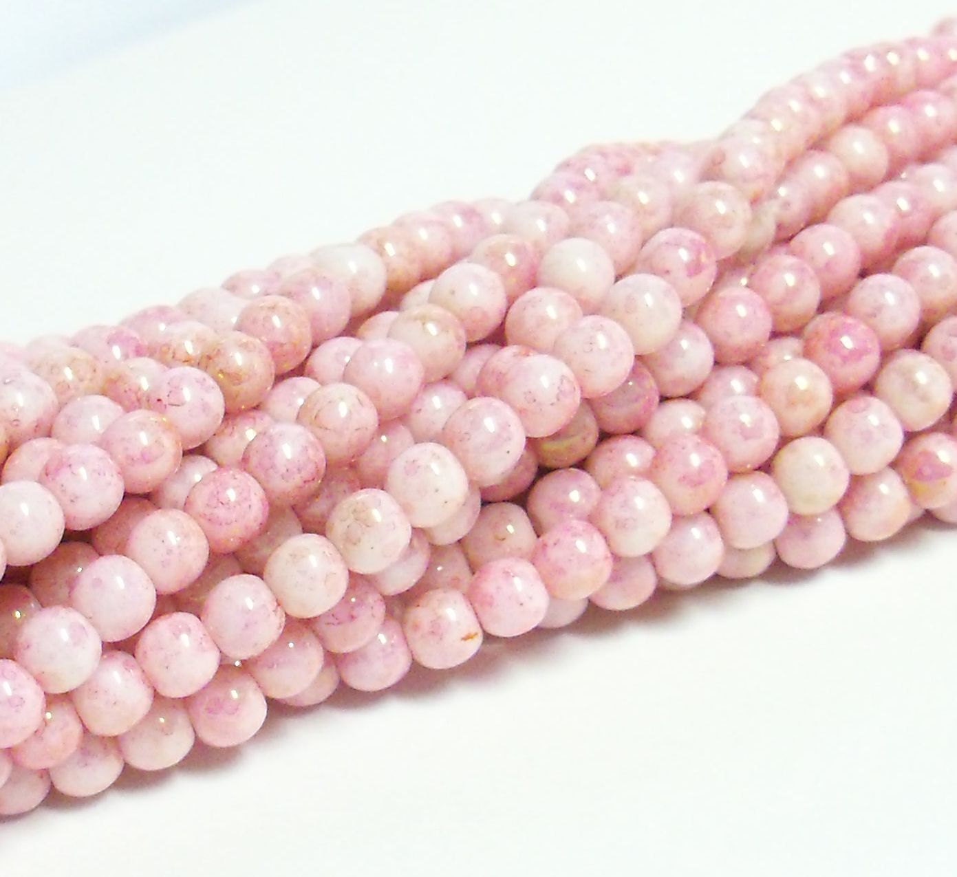 Czech Pressed Glass Druks - 4mm - Opaque Topaz Pink Luster - 50 Beads