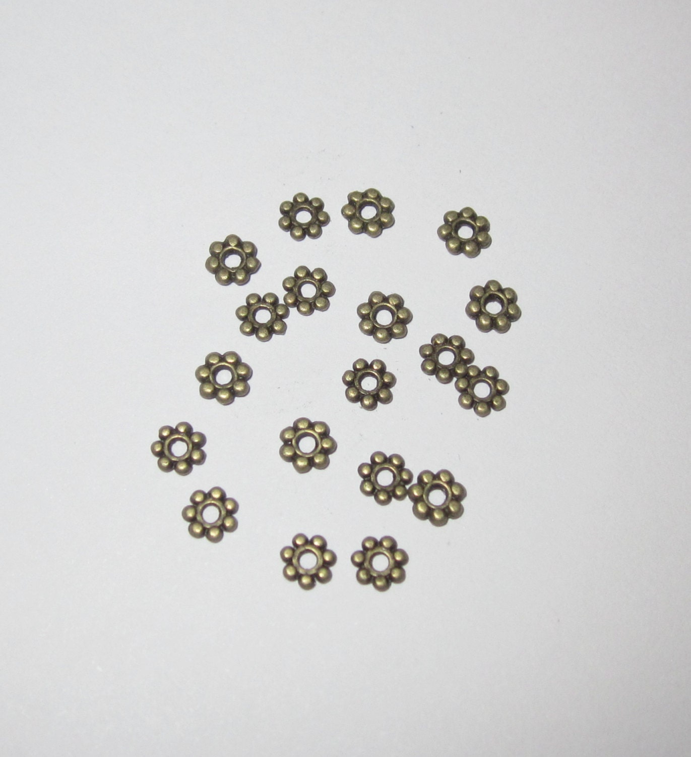 Antique Bronze Spacer Beads Tibetan 4mm x 1 1/2mm (24)