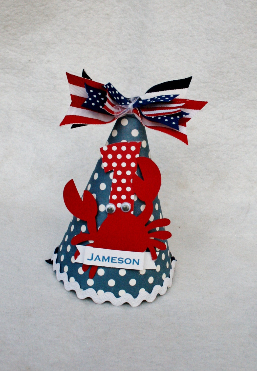 Crabby Little Dude party hat in red, navy blue, polka dot with stripes