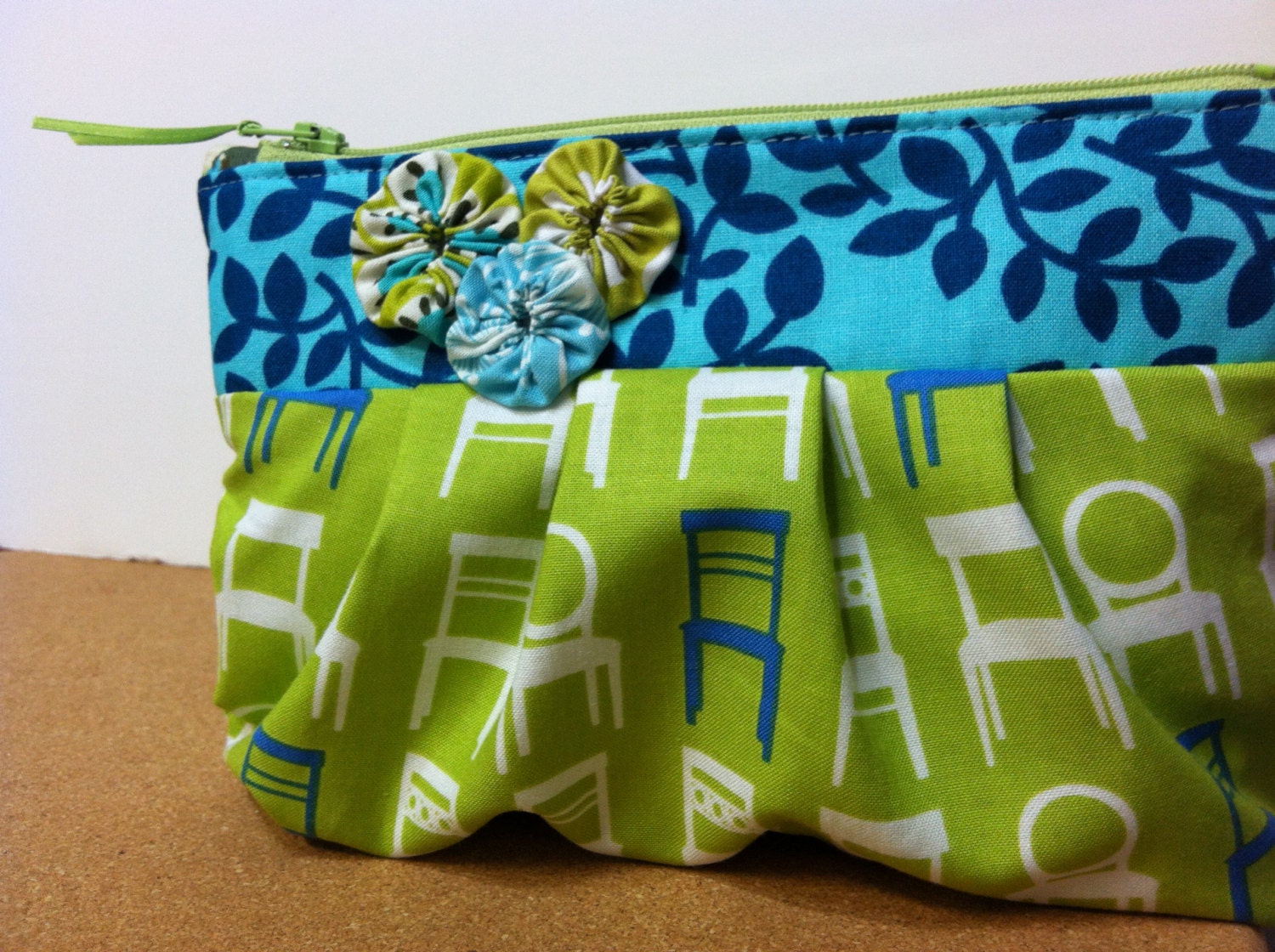 lime green chair silhouette zippered cosmetic pouch