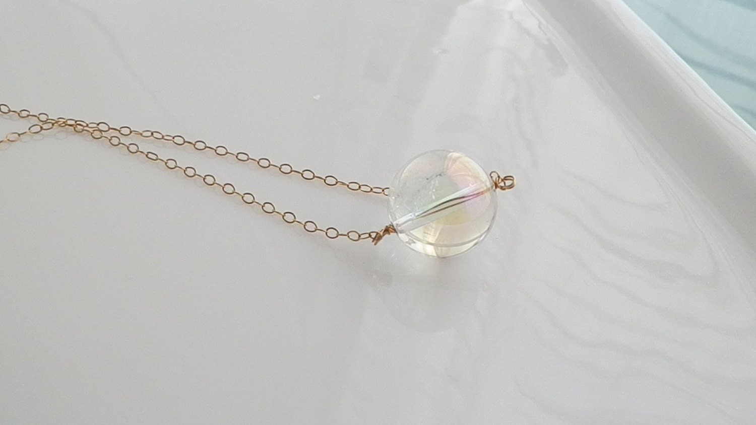 Gold chainmaille necklace crystal clear quartz pendant