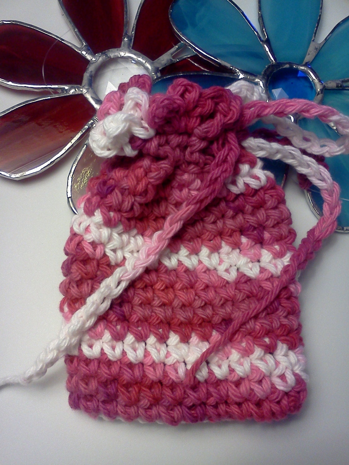 Soap Saver....Jewelry Pouch....Change Bag.  The uses are endless.......