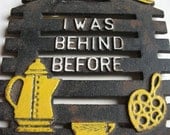 Vintage Cast Iron Trivet - I Was Behind Before