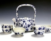 Art Pottery tea pot with six matching tea bowls