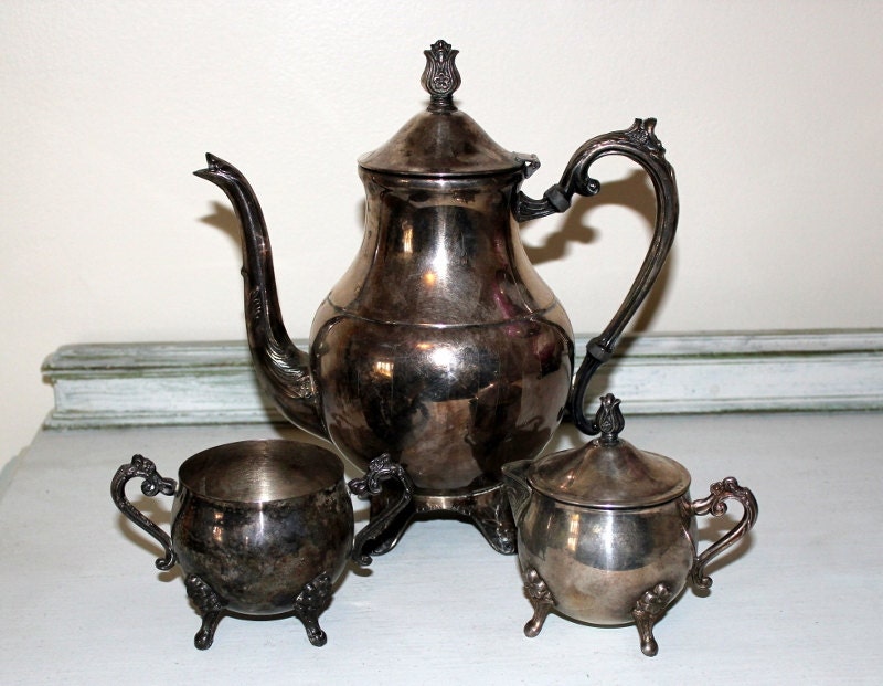 Gorgeous and tarnished silver tea set teapot, sugar and creamer