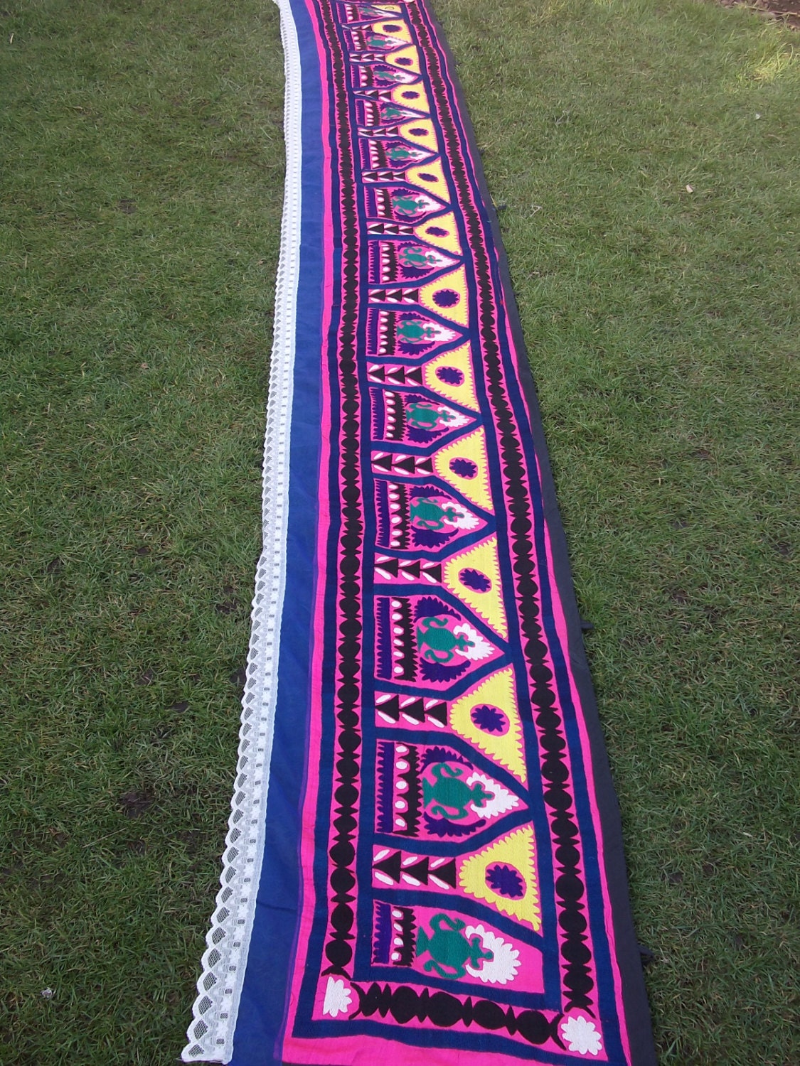 12 feet very long  Bright Pink hand embroidered Zardevor Suzani from Uzbekistan. Wall hanging.