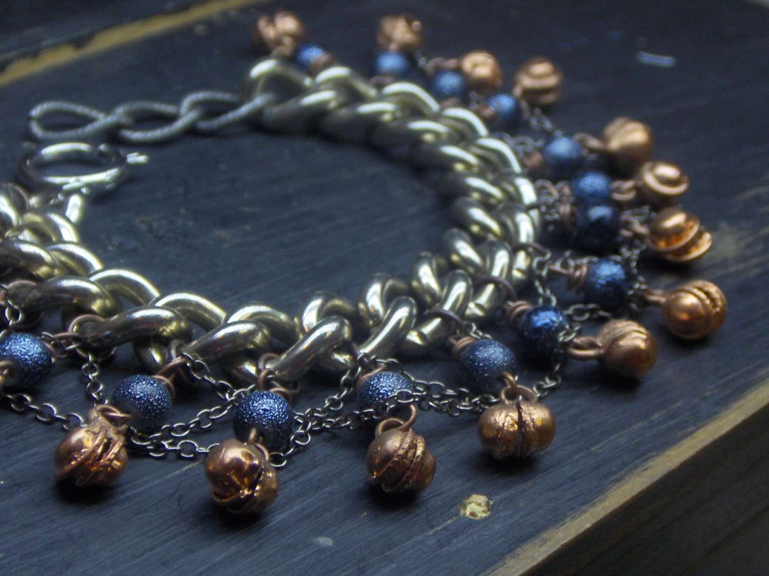 GYPSY DANCER. Bohemian Gypsy copper bells , midnight blue bumpy glass pearl and upcyled chunky steel curb link ooak bracelet