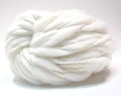 100 yards and 6.5 ounces handspun super bulky cream yarn in undyed thick and thin merino wool