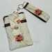 French Post Cards from Paris in Ivory Coral & Brown Phone Case with Wristlet with Button Closure with Back Zipper Pocket