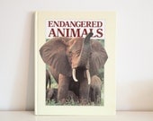 vintage endangered animals hard back book
