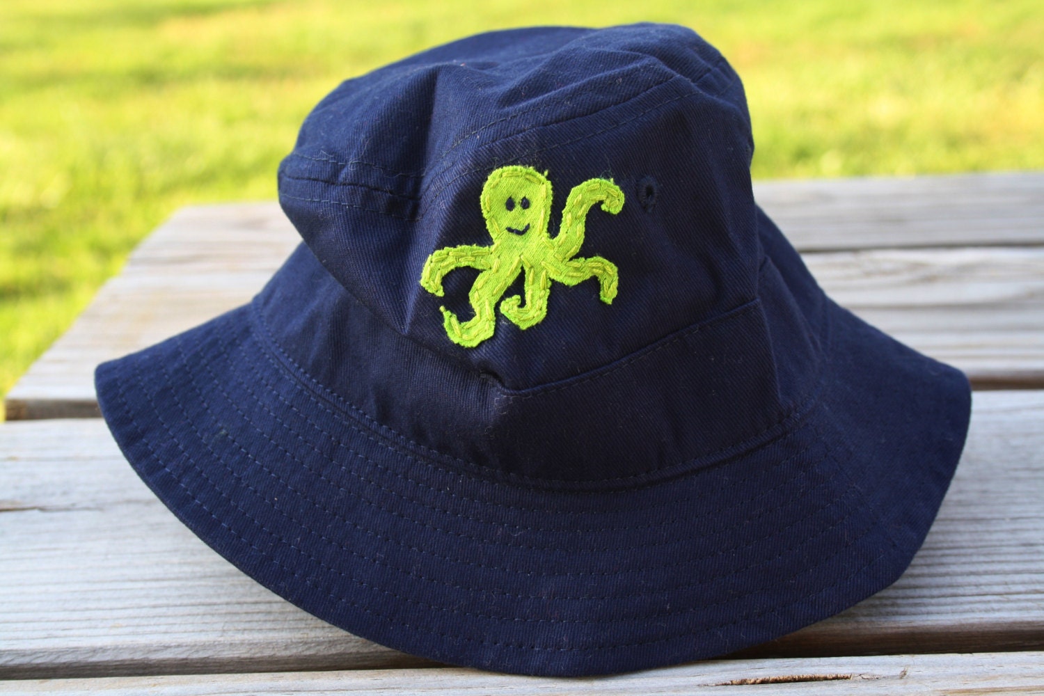 Octopus Toddler or Infant Bucket Hat, handsewn recycled t-shirt applique, cute beach or pool hat