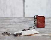 Book Necklace: OOAK. Small, covered in a bit of a rusty coloured vintage jacket, reclaimed leather.