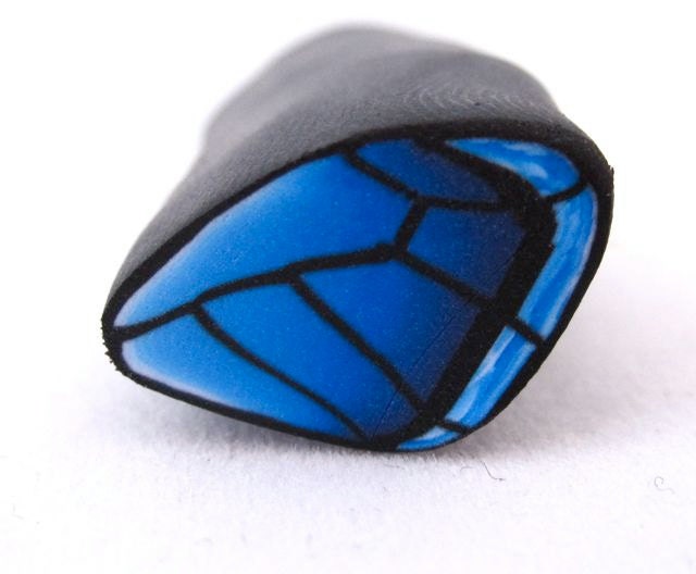 Unbaked polymer clay butterfly cane