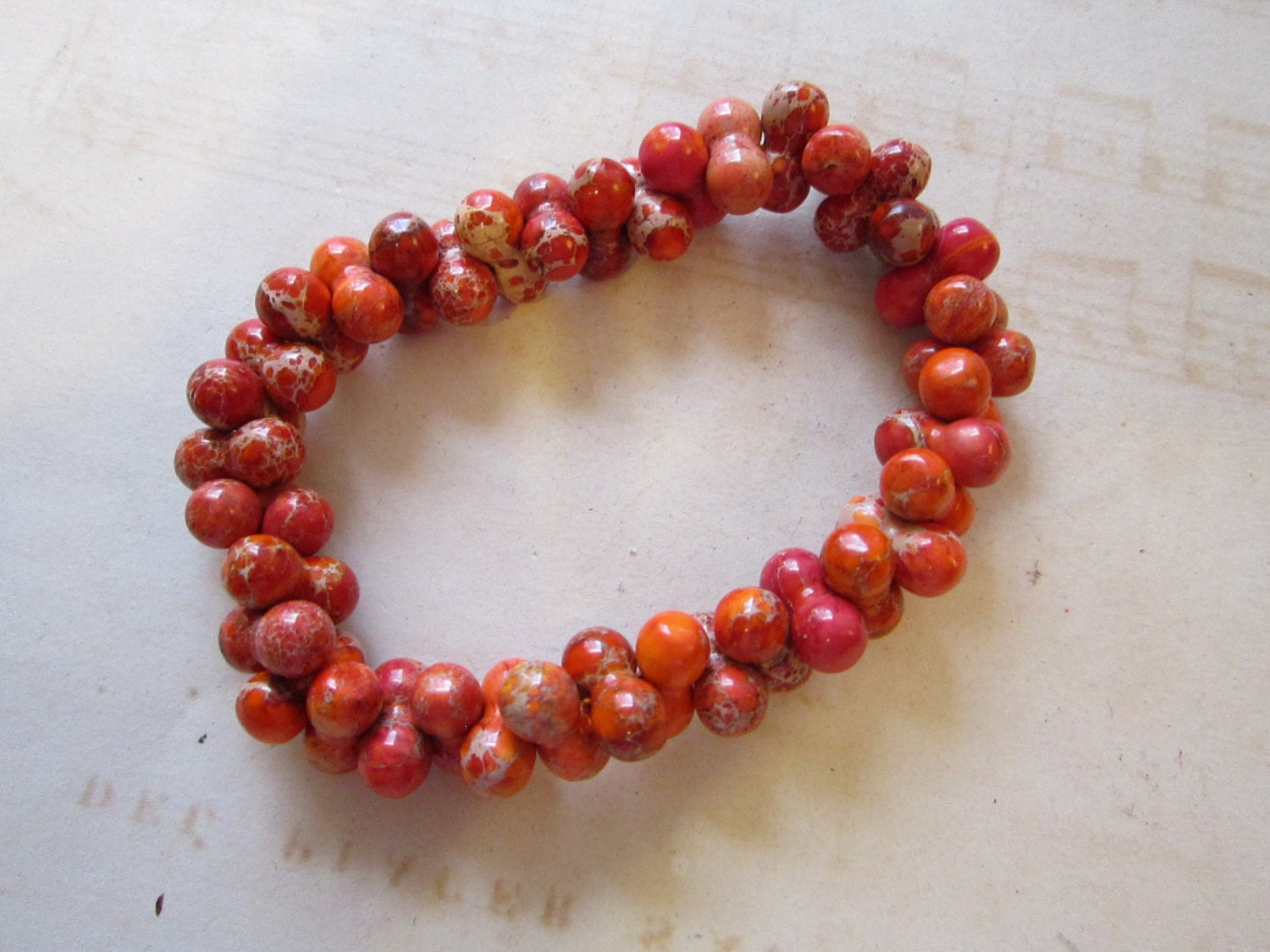 SALE - stone beads - ORANGE - approx 5mm x 10mm - oblong shape