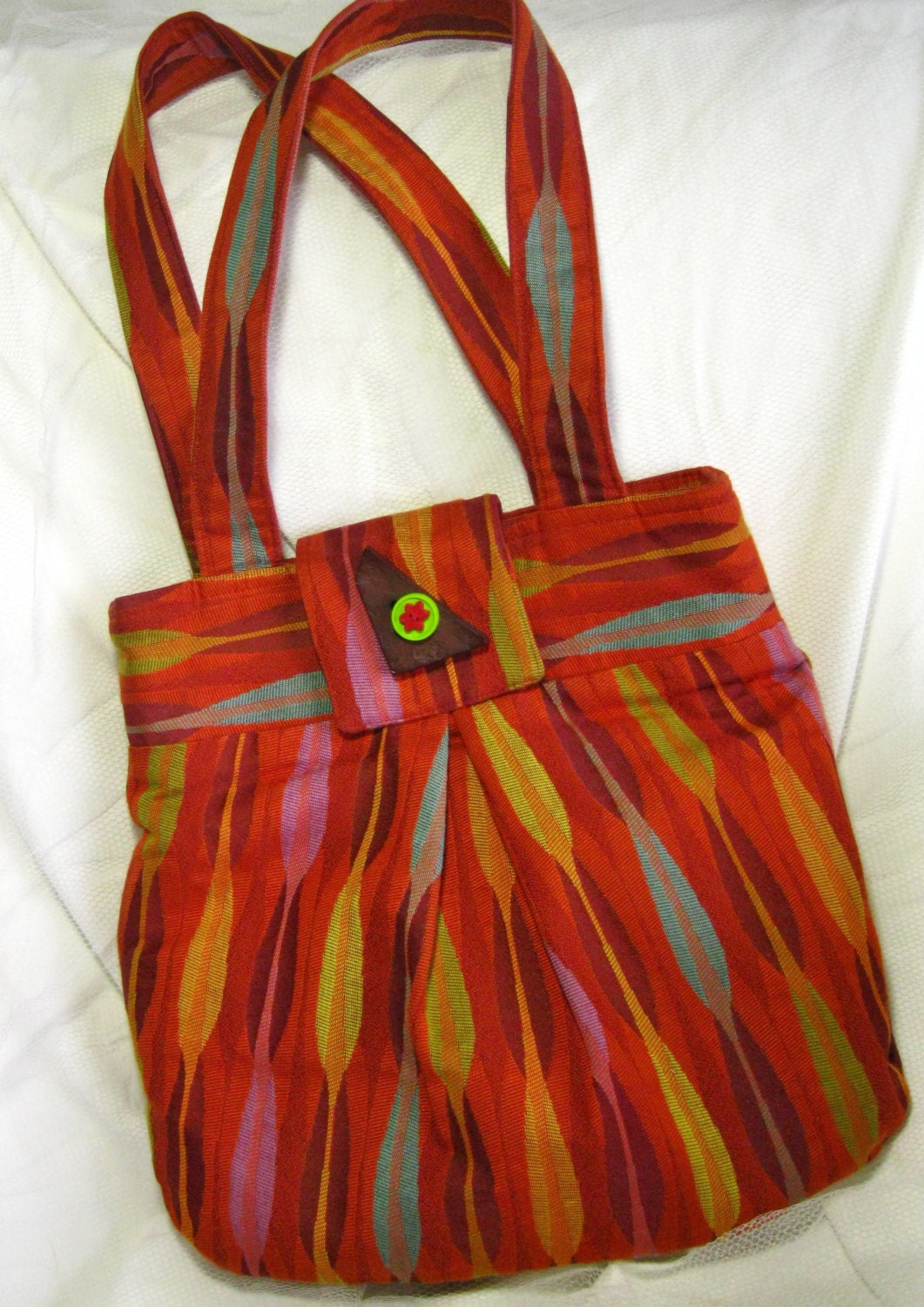 bright multi colored handbag, red, teal, orange, yellow