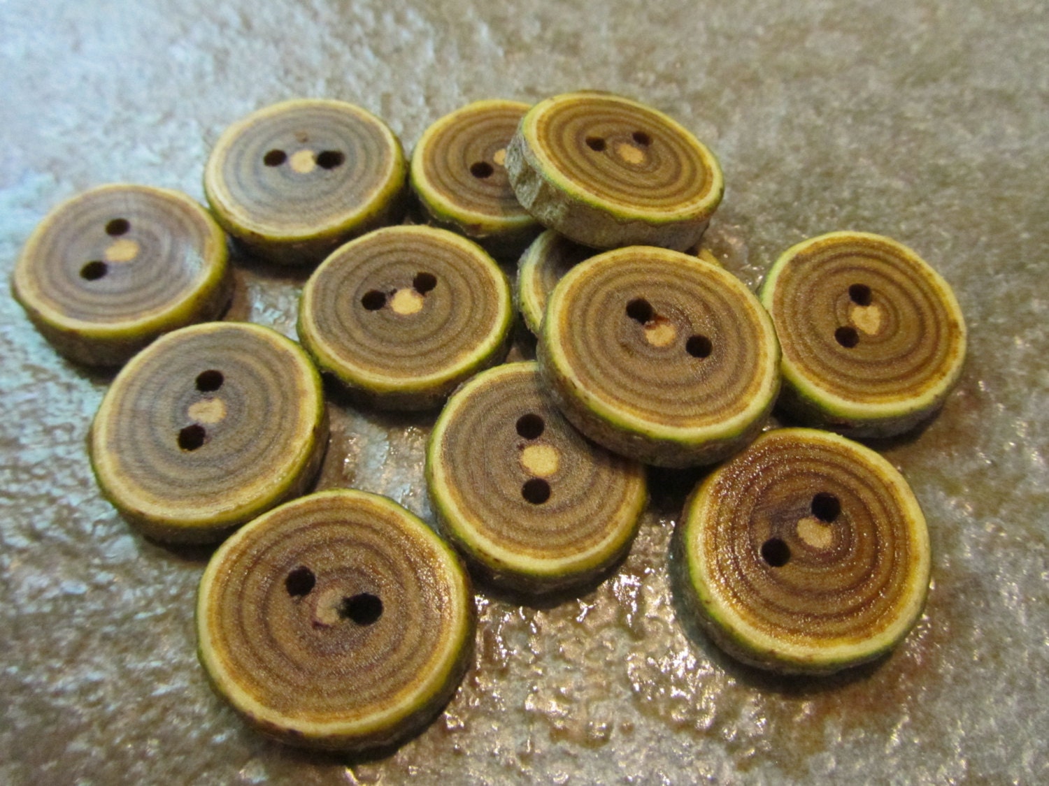 12 Sumac Buttons.  Just Under 1 Inch Wide.