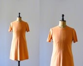 Vintage 1960s pumpkin scooter dress. mod mini dress