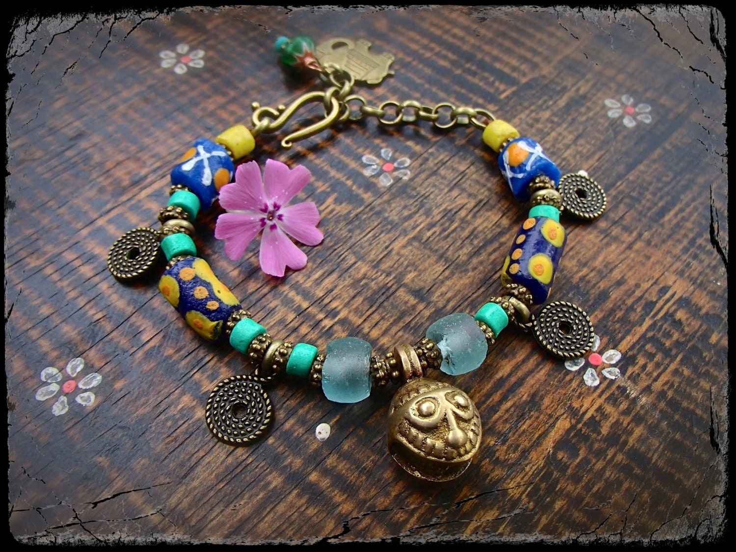 AFRICAN jingle BRACELET brass jingle bell charm Hippie bracelet Smiley Face stackable bracelet Chunky bracelet nomad jewelry Elephant