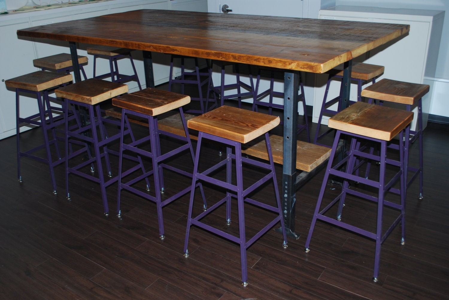 Industrial style table with shelf below. We make them in any size. 108" l x 48" w x 42"  tall