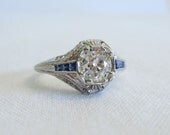 Incredible Platinum Engagement Ring. Diamonds and Sapphires in Filigree Platinum Setting.