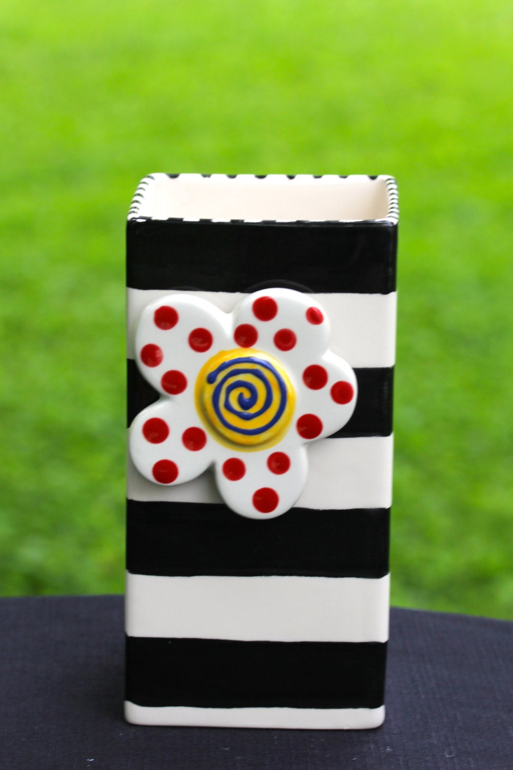 Whimsical vase with changeable charm