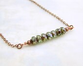 Elegant Industrial Necklace with Green Faceted Czech glass beads and copper gear spacers - Wire Wrapped Beaded Bar Necklace