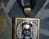 Memory locket with lead free pewter cat angel with black cord