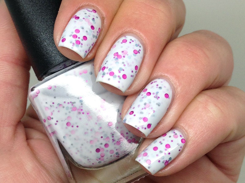 Nail polish - "Sakura" pink and charcoal glitter in a white base