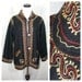 1960's Embroidered Kashmiri pashmina jacket. Black wool, gold & red embroidery. Bhola Kashmiri Craft.