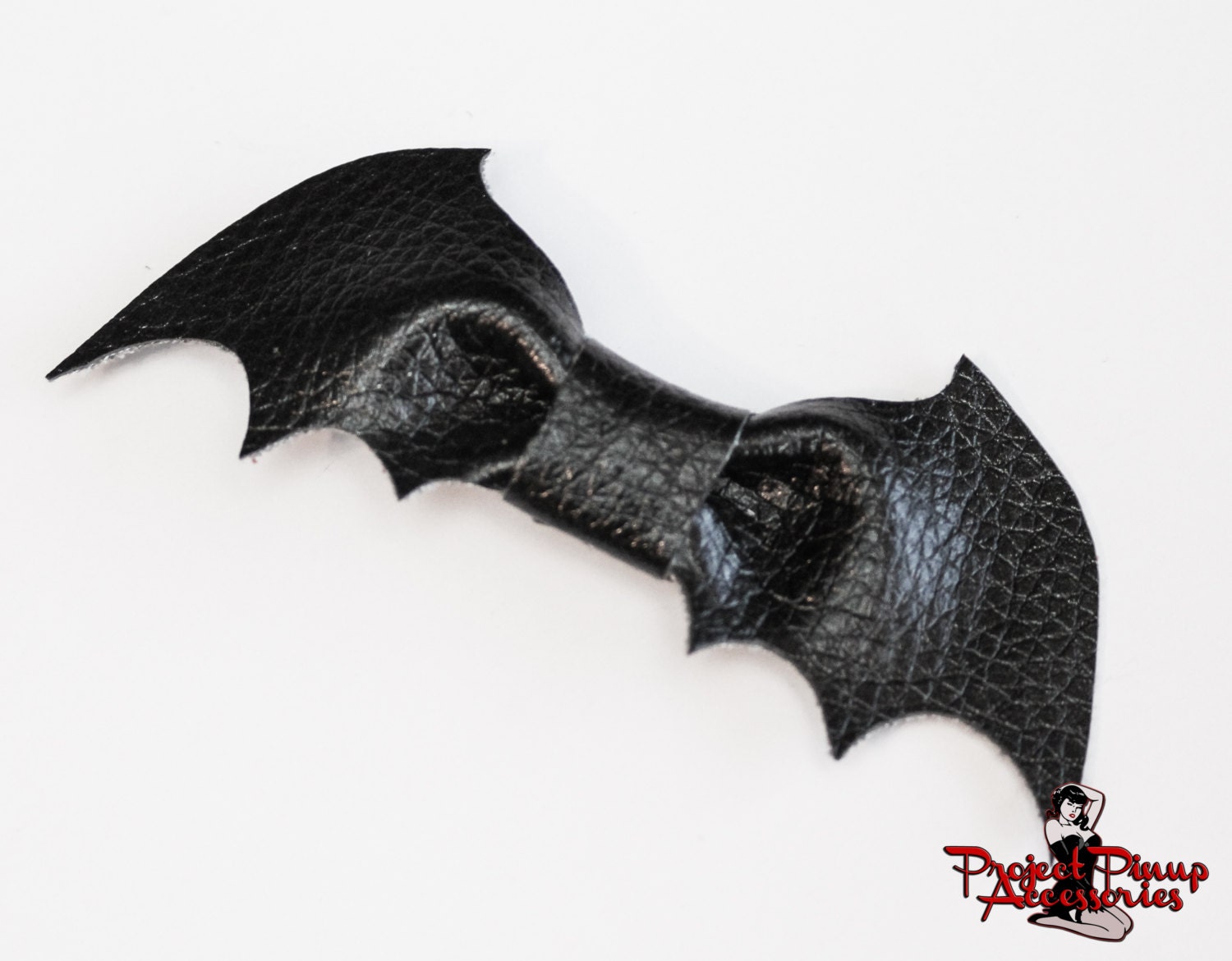 The Bat Bow Faux Leather Hair Clip