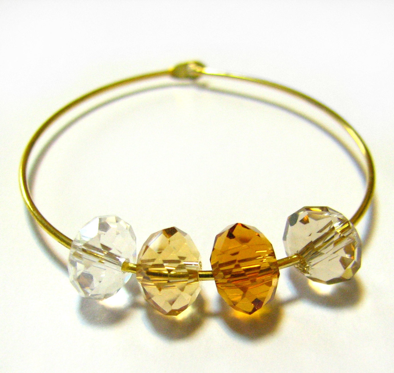 Golden Circles earring - Swarovski rondelles, hoop, gold colored, amber