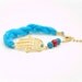 Gold Plated Hand of Fatima, Hamsa Hand Guardian Bracelet with Turquoise Blue Silk Fabric Cord , Turquoise Stones and Red Coral Beads