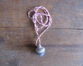 Felted wool acorn pendant necklace, grey-black heather with metallic silver-colored cap