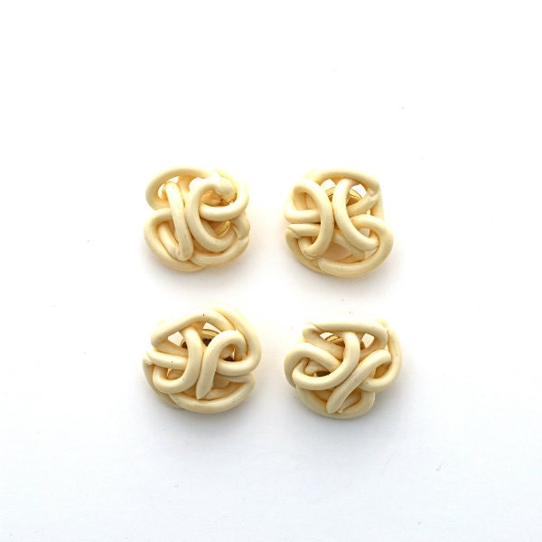 Vintage Buttons Extruded Celluloid Spaghetti 1 Inch Knot Four Cream White