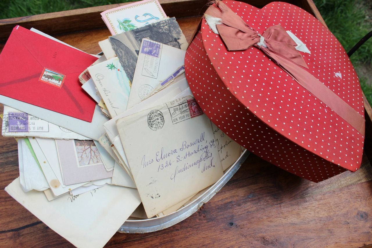 Vintage heart box full of different cards and postcards 1930-1950s