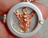 Captured Love: Destiny - Genuine loose round cut diamonds floating in a silver tone locket with a copper angel inside, sealed, will not open