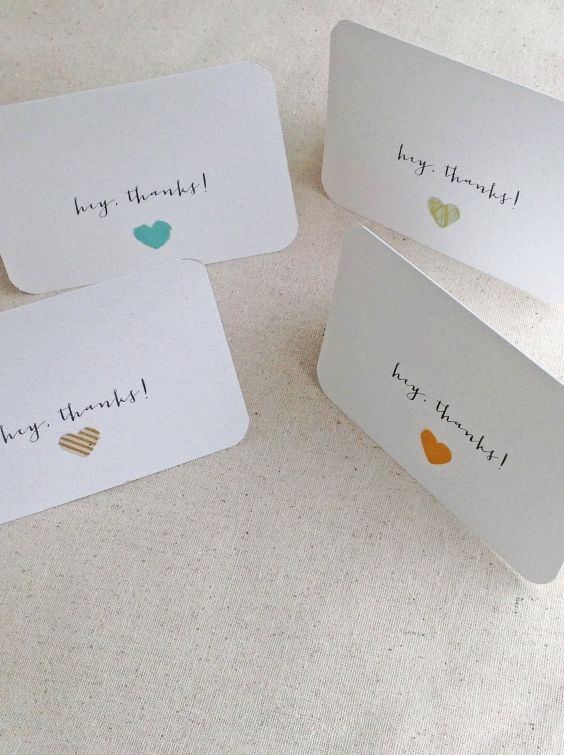 hey, thanks stationery - recycled white card set with hand punched heart (set of 4)